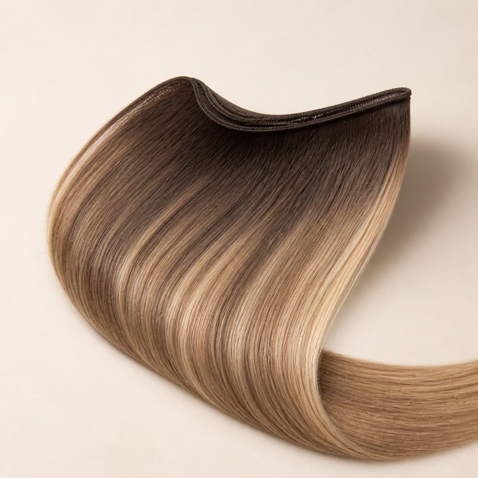 Brown and blonde balayage Genius Weft virgin human hair extension with a slim flexible seam
