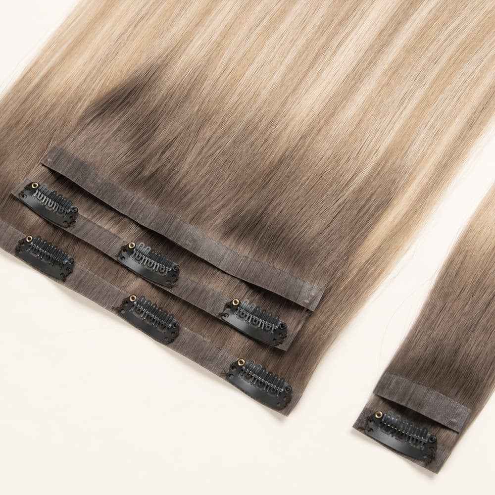 Brown and blonde PU Clip-In human hair extensions with a seamless polyurethane base and secure clips