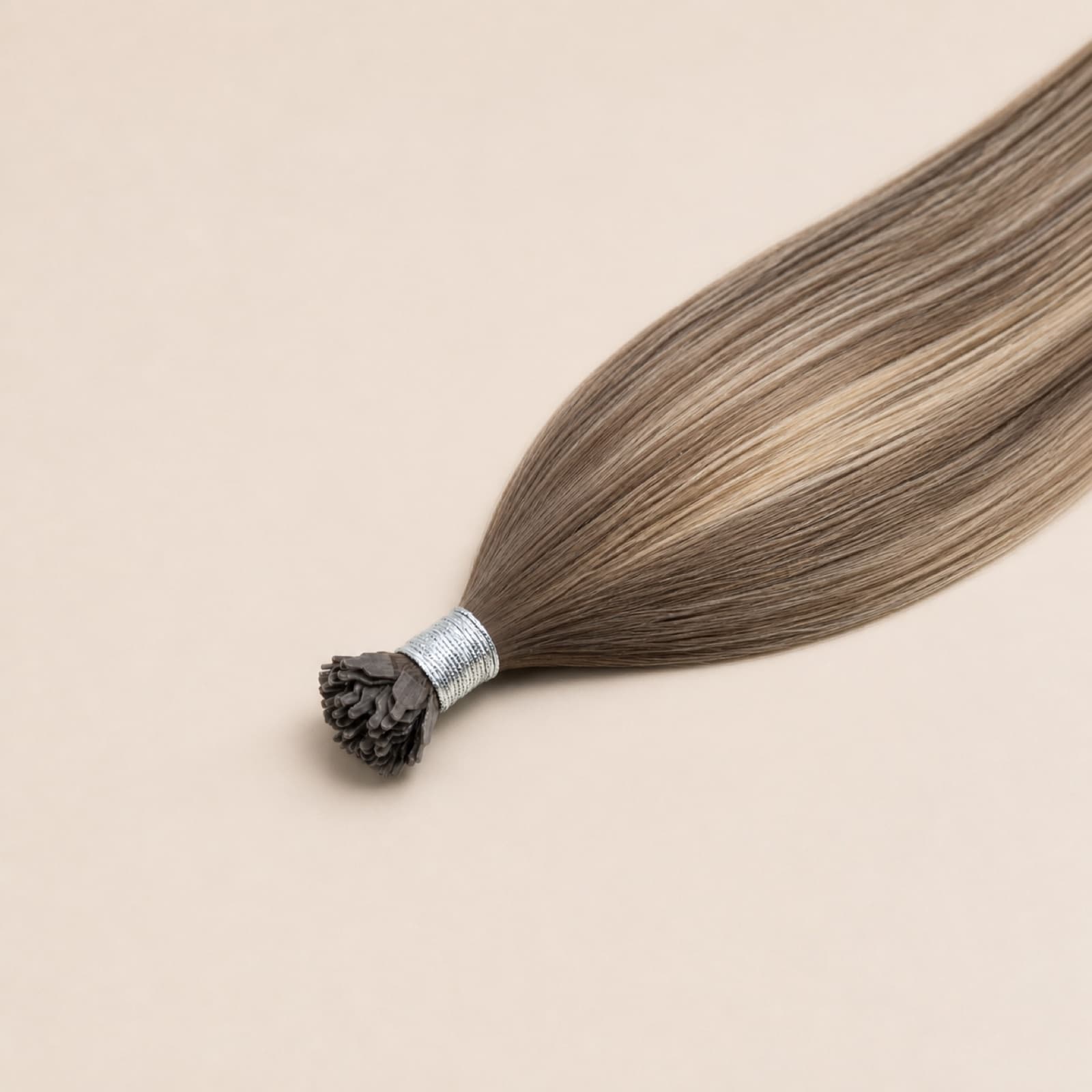 Ash brown and blonde Y Tip virgin human hair extensions with flat keratin bonds
